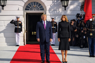Trump Appears To Struggle To Walk Straight as He Pushes Melania off Red Carpet While Waiting for Xi Jinping