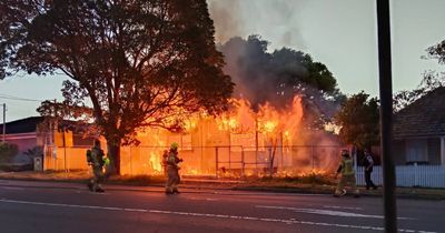 Emergency operation unfolds as house goes up in flames