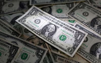 Dollar set for weekly gains as yields surge, Fed bets build