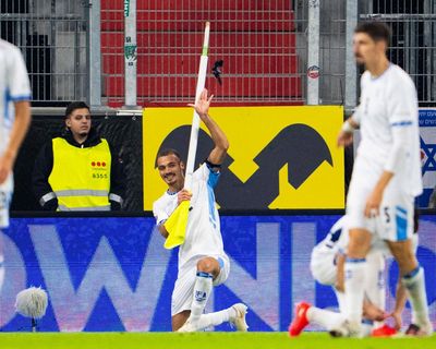 Israel’s Saied Abu Farchi sent off for corner flag celebration in defeat by Austria