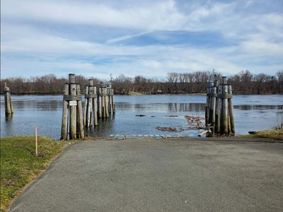 A ferry has crossed the Connecticut River at Rocky Hill since 1655; the state still runs it eight months a year, a three-car barge pushed across by a diesel towboat