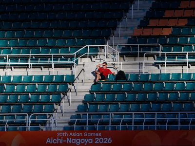 Japan organisers 'not satisfied' as empty seats blight Asian Games