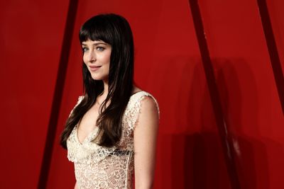 Dakota Johnson's Ivory Lace 'Verity' Screening Look Includes a Sheer Twist
