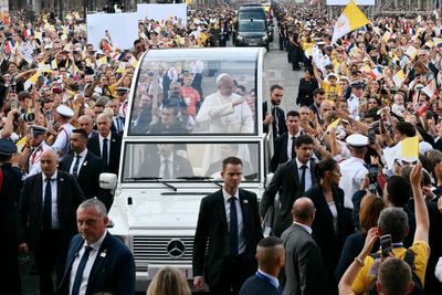 Pope Leo attracts 700,000 people as he parades through Paris before outdoor Mass
