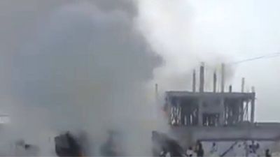 At least 13 dead in suicide bomb blast near police post in northwestern Pakistan