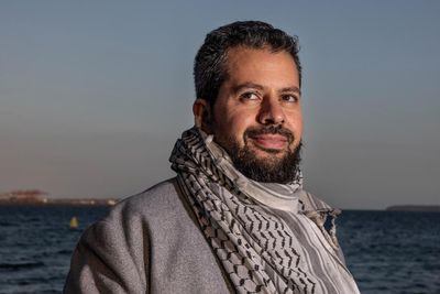 Palestinian careers adviser who was allegedly told to stop wearing keffiyeh at NSW school sues state for racial discrimination