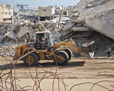 61m tonnes of rubble: Gaza aid workers face delicate task of clearing ruins concealing up to 10,000 bodies