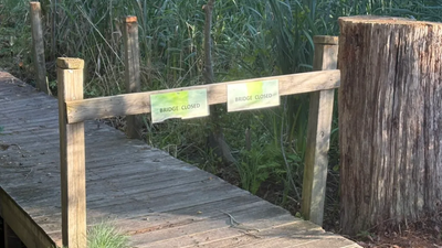 Erin Gardner raises $2,200 to rebuild a 24-foot bridge, replacing railings for safer trails