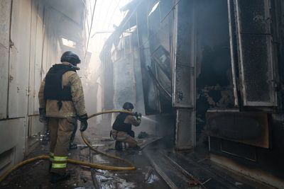 Russian strikes kill 2 in Ukraine after Moscow rejects German calls to de-escalate