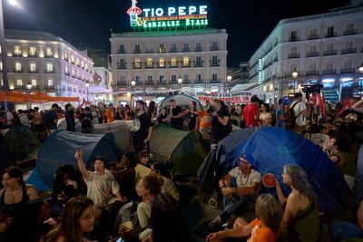 87-year-old’s eviction sparks encampment in Madrid plaza to protest housing crisis