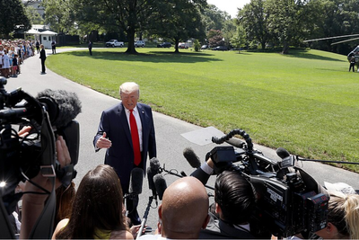 Donald Trump Branded a 'Snowflake' and 'Coward' After Telling a Female Reporter To Be 'Quiet'