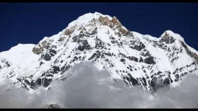 Avalanche Buries Himlung Base Camp: 16 expedition staff feared dead; bad weather stalls rescue