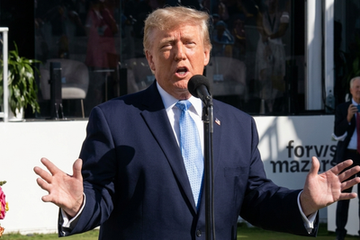 'F--King Paedophile!' Trump Heckled by Golf Fan After Boasting of 'Great Reception' at Presidents Cup
