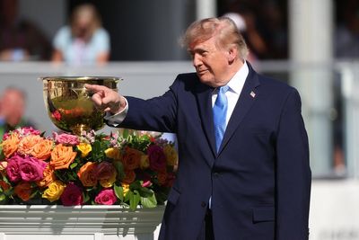 Donald Trump conducts awkward handshake with Adam Scott at Presidents Cup