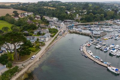 Ten people arrested after migrant boat lands at tiny harbour in Cornwall