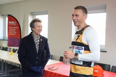 Princess Royal jokes with Sir Kevin Sinfield about joining him on a horse