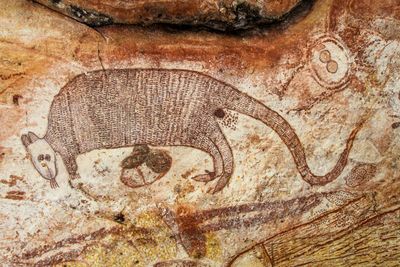 False claims about Aboriginal rock art and aliens were once fringe. Researchers fear AI could push them mainstream