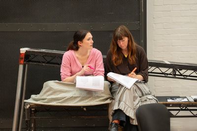 Charlotte Ritchie studies script in first-look rehearsal images for Cloud 9