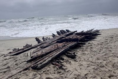 Nor’easter unearths pieces of 19th-century shipwreck in Massachusetts