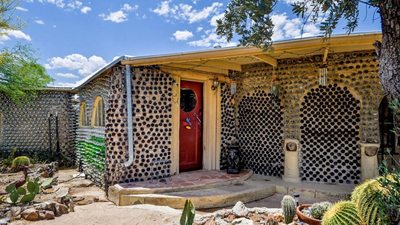 In 1964, an Arizona couple began building a carport with discarded bottles; years later...