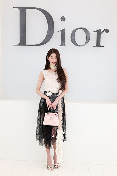 Jang Wonyoung Pairs a Sheer Black Skirt With a Pastel Pink Bag at Dior's Spring/Summer 2027 Show