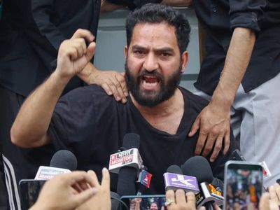 AAP MLA Mehraj Malik marshalled out of J-K Assembly