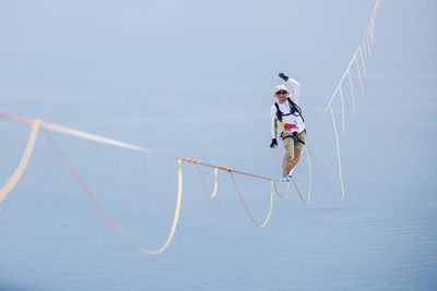 Daredevil Jaan Roose completes slackline walk high above central Seoul
