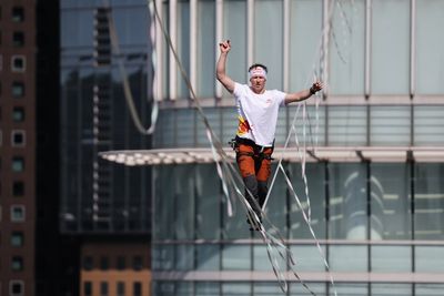 Daredevil slackliner takes on 160-metre highline 120 metres above Seoul