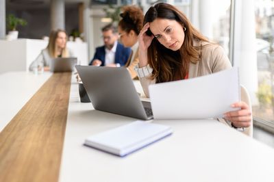 The rise of the 'two-job job': 61% of workers say they're now doing more than one role
