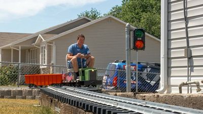 Utah man builds backyard railroad with 40,000 pounds of gravel for $18,000