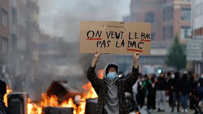 French students clash with police as school protests spread nationwide