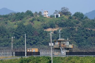 North Korea test-fires missile as tensions grow over border mine blasts