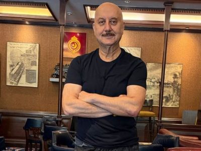 Anupam Kher lives in Mumbai home with wife Kirron and son Sikander featuring artefacts, awards, career photographs, Ganesha idols, Sikander’s film memorabilia and a balcony overlooking lush greenery