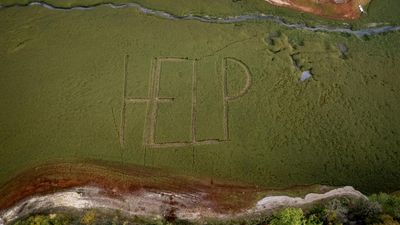 Cry for help as French-Swiss lake dries up in record summer heat