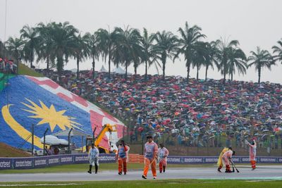 Heavy rain causes chaos at start of Bahrain Grand Prix