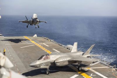Persian Gulf oil flows return to prewar levels, but Iran could resort to a 'scorched earth campaign' as U.S. deploys more ships and Marines to Mideast