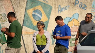 Brazil election: Lula, Flavio Bolsonaro head to runoff after tight first-round vote
