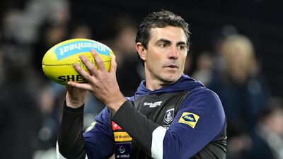 Kangaroos set to make call in AFL coaching race