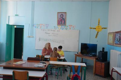 On a remote Greek island, empty classrooms signal a crisis across Europe