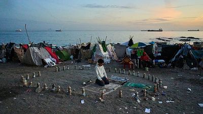 Spanish police remove over 3,000 migrants from Ceuta beach camp