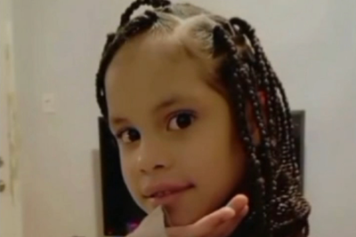 Woman charged with murder after girl, 7, stabbed to death by stranger in street
