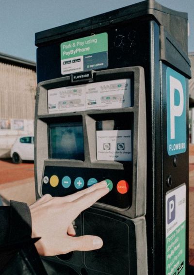 Before You Scan a Parking Meter QR Code, Check This — Scammers Are Covering the Real Ones