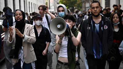 Teenager loses hand picking up grenade in France school protests