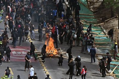 Tear Gas, Water Cannons and a Disputed Tally: Is Chile's Education Budget Going Up or Down?