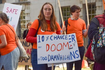 ‘Pull the plug’: protesters resort to direct action against AI firms
