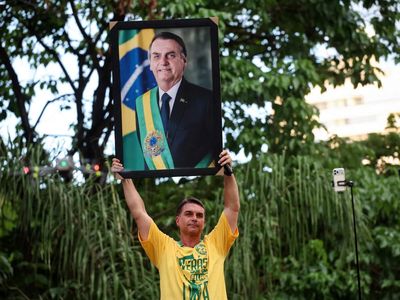 Brazil election: Bolsonaro’s son Flavio surges as father’s political comeback gathers pace