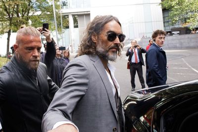 Russell Brand says 'God bless you' as he leaves court ahead of start of rape trial