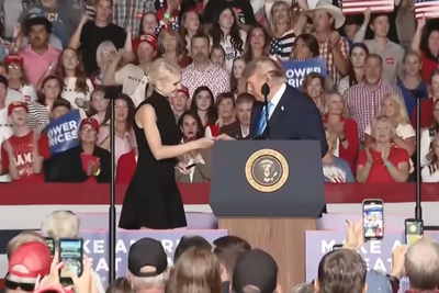 Trump Appears to Eye Harp's Legs Before Calling Her a 'Perfect Person' as She Delivers Red-Dyed Diesel Order at Nebraska Rally