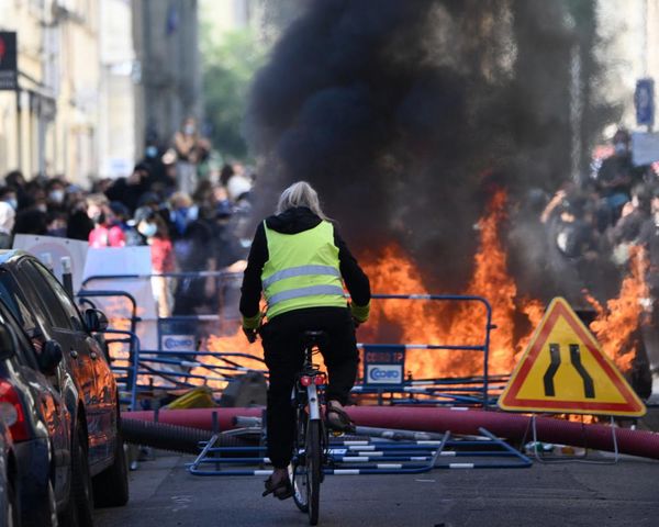 On the barricades with wheelie bins and shopping trolleys: Paris students rage at politicians and police