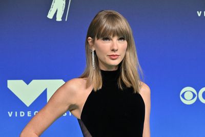 Taylor Swift Wears a Simkhai Minidress for Surprise 'SNL' Appearance With Dakota Johnson